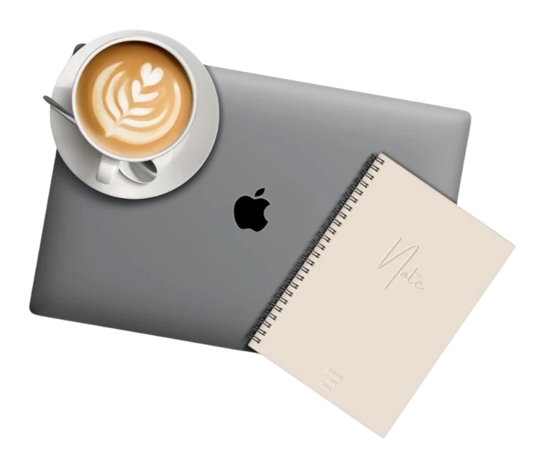 Computadora, cuaderno y café